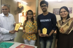 The winning team from Semester 1 BBA for debate organized at Gujarat University Youth Festival 2019; with Principal K J Patel and event in-charge Prof. Ghata Shukla