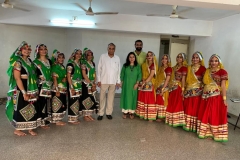 Beauties geared up for folk dance in traditional finery; with Principal K J Patel, event in-charge Prof. Yukti Modhiya and choreographer Kalrav Dave